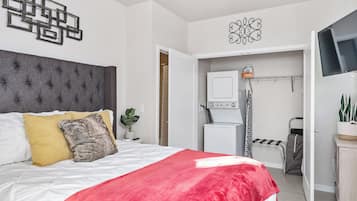 1 bedroom, desk, iron/ironing board, travel crib