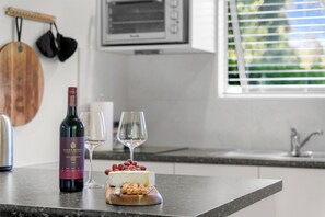 Fridge, microwave, toaster, cookware/dishes/utensils