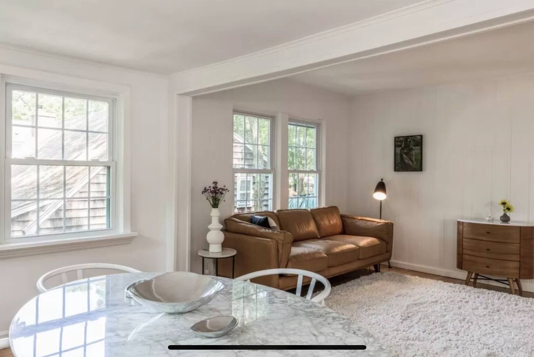 Living room with record player and fireplace