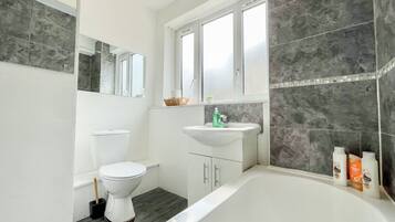 Eco-friendly toiletries, hair dryer, towels