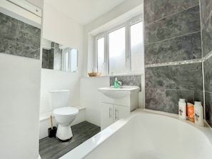 Eco-friendly toiletries, hair dryer, towels