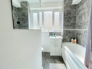 Eco-friendly toiletries, hair dryer, towels