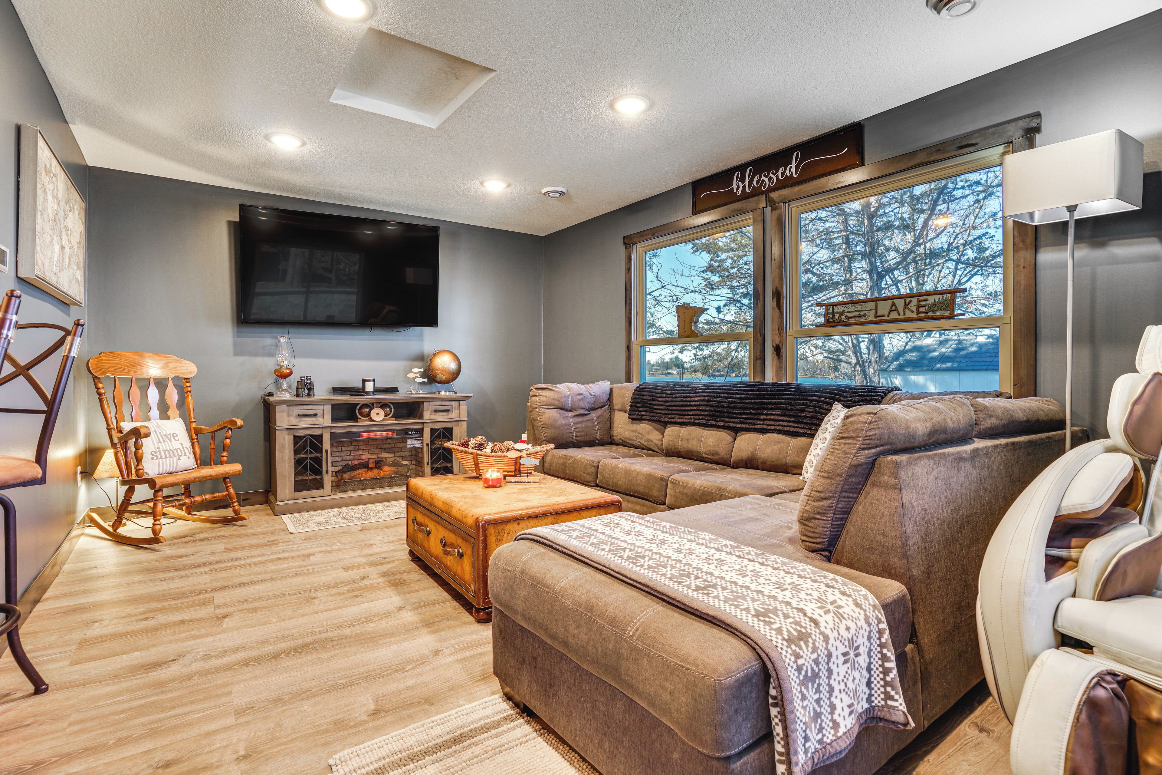 TV, fireplace, books, music library