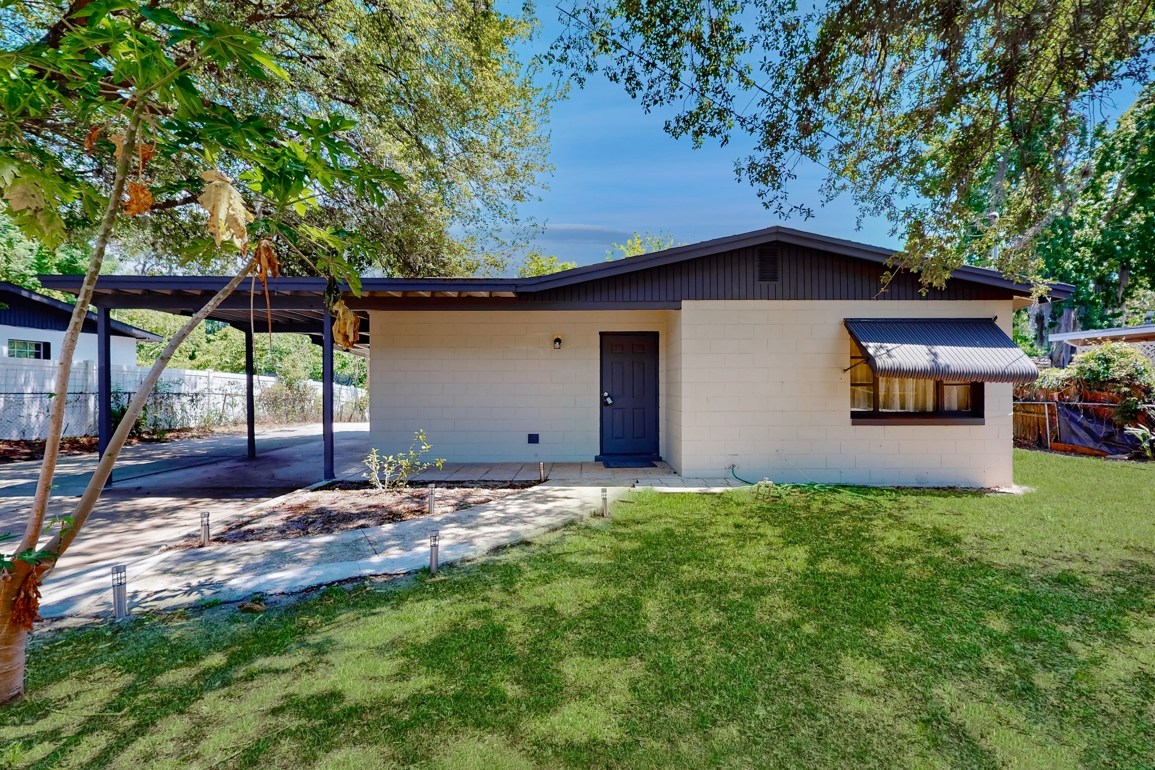 Dog-friendly house near town with backyard fruit trees, patio, W/D, & central AC