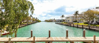 Waterfront, dog-friendly home with beautiful canal view & 2 shaded porches