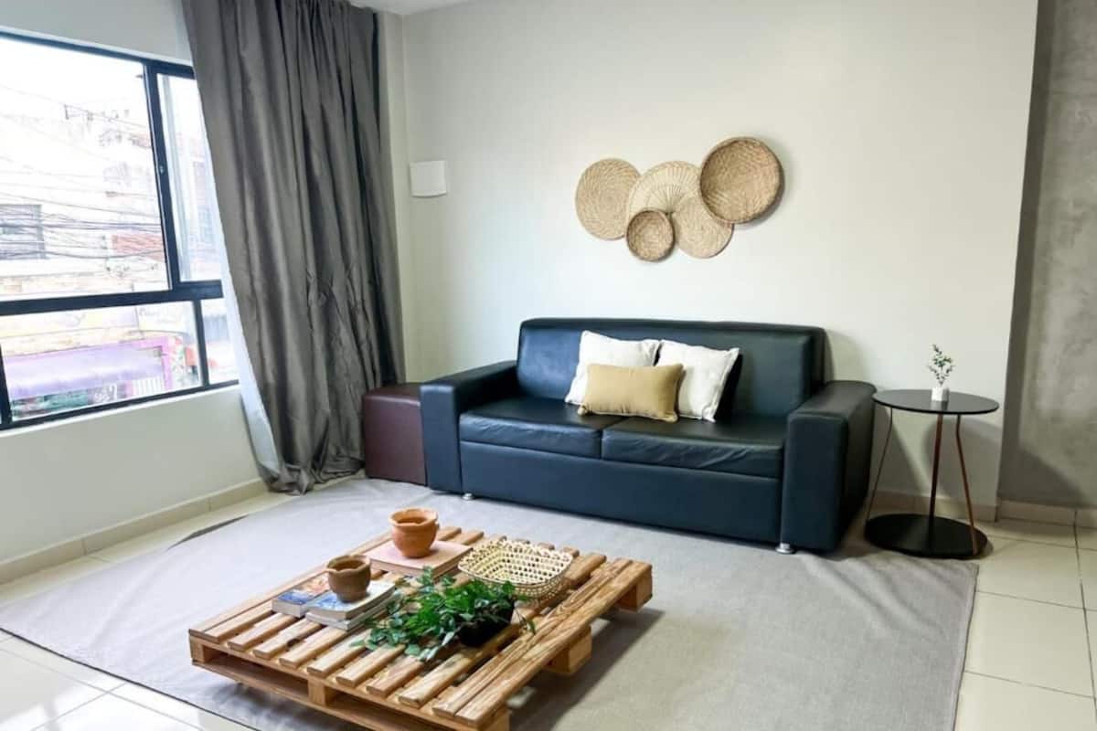 Panoramic Studio | Living area | Flat-screen TV