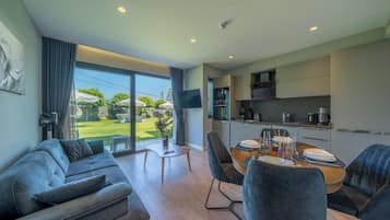 Standard Suite | Living area | 23-inch LCD TV with cable channels