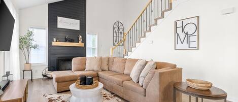 Smart TV, fireplace, foosball