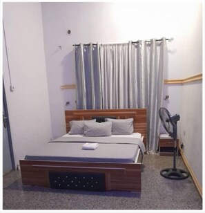 Deluxe Room | 1 bedroom, premium bedding, down comforters, free WiFi