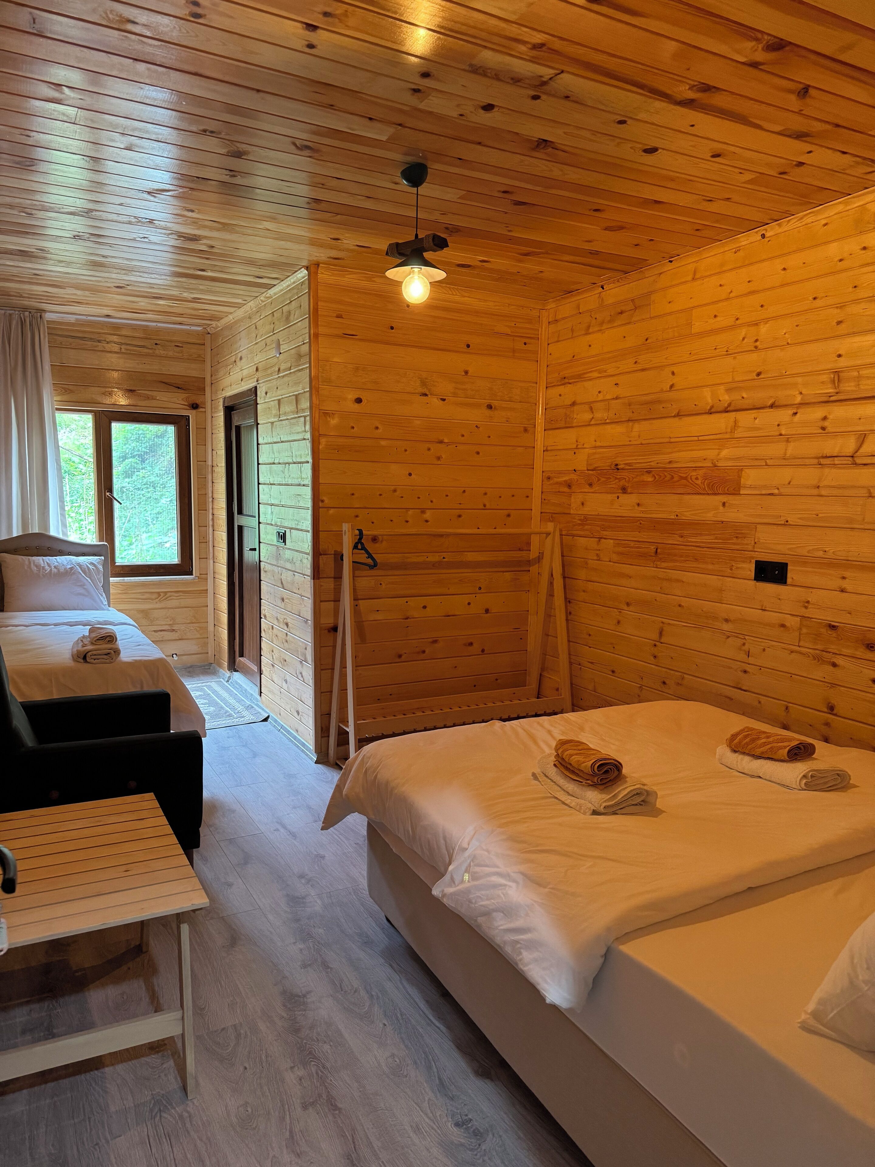 Comfort Room | Premium bedding, desk, laptop workspace, soundproofing