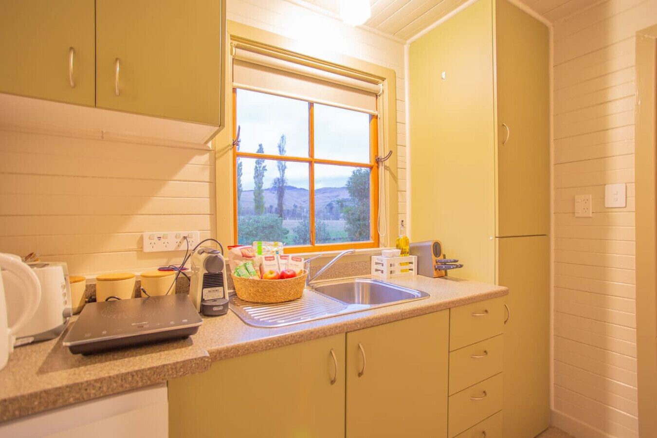 Fridge, microwave, stovetop, coffee/tea maker