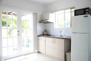 Fridge, microwave, stovetop, coffee/tea maker