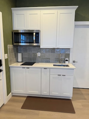 Fridge, microwave, stovetop, coffee/tea maker