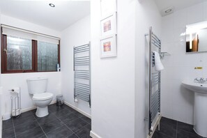 Hair dryer, towels, soap, shampoo