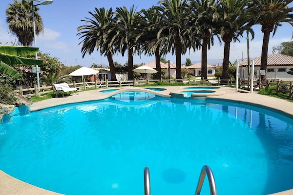 3 outdoor pools, open 11:00 AM to 8:00 PM, pool umbrellas