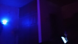 A dimly lit room with a visible light source on the left and a vertical light on the right. - Crale n Busino (Port Harcourt)