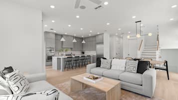 Jade House at The Gemma | Living area | 55-inch Smart TV with digital channels, Netflix, Hulu