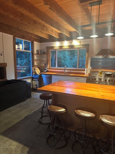 "Sleeps 15: Dog-Friendly Rustic Haven on Cortes Island" Large grass yard