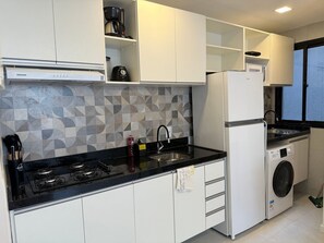 Economy Apartment | Private kitchen | Fridge, microwave, stovetop, coffee/tea maker