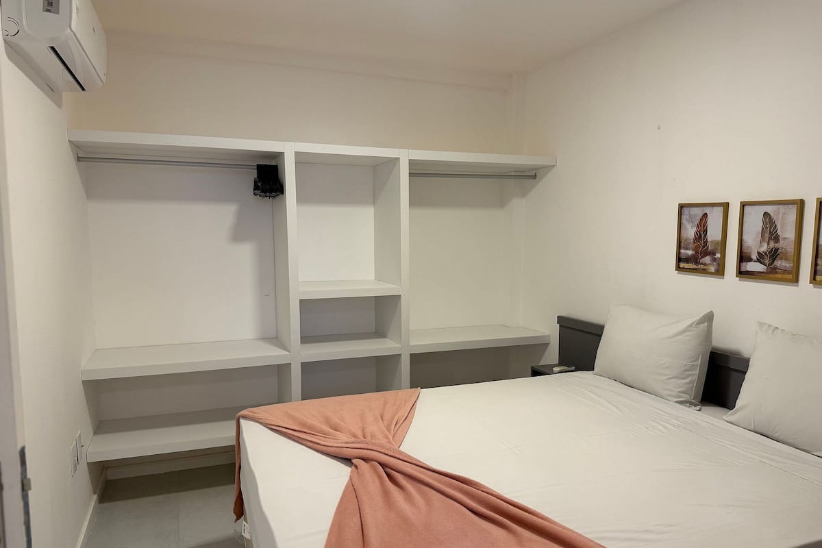 Economy Apartment | Premium bedding, blackout drapes, iron/ironing board, free WiFi
