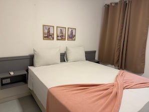 Economy appartement | Luxe beddengoed, verduisterende gordijnen, een strijkplank/strijkijzer