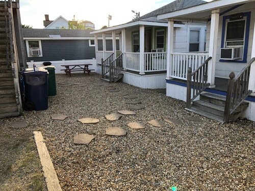 New to VRBO! Charming 2 bedroom cottage just steps from the beach!