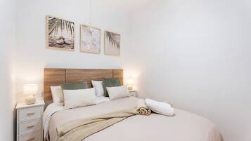 1 dormitorio, tabla de planchar con plancha, wifi gratis y ropa de cama