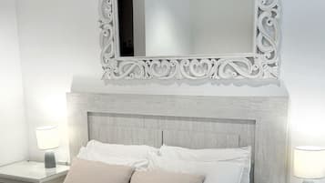 1 habitación, tabla de planchar con plancha, cuna de viaje y wifi