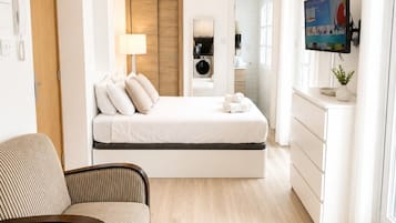 Iron/ironing board, travel crib, WiFi, bed sheets