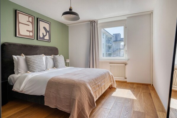 2 dormitorios, tabla de planchar con plancha, wifi y ropa de cama