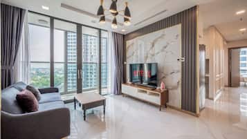 Luxury Apartment, 3 Bedrooms, City View | Living area | 55-inch flat-screen TV with digital channels
