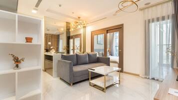 Luxury Apartment, 1 Bedroom, City View | Living area | 55-inch flat-screen TV with digital channels