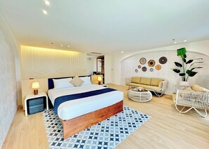 Executive Suite, Balcony, Partial Ocean View | Frette Italian sheets, premium bedding, in-room safe, desk