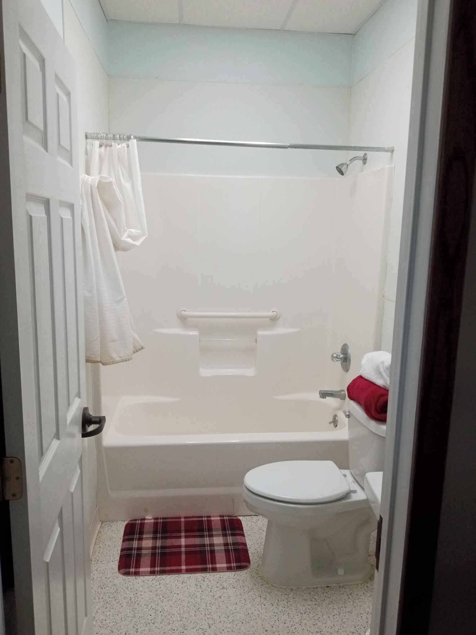 Shower, towels, soap, toilet paper