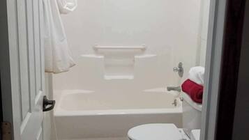 Shower, towels, soap, toilet paper