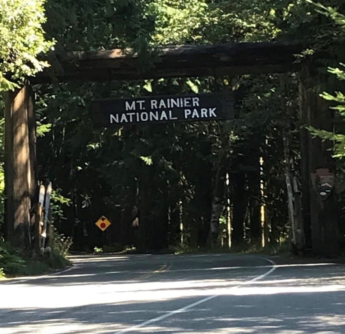 A road sign for Mt. Rainier National Park.