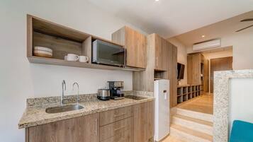 Fridge, microwave, stovetop, coffee/tea maker