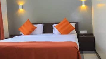 Deluxe Double Room | Living area | 21-inch LCD TV with digital channels