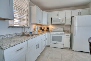 Fridge, microwave, oven, stovetop - Stunning Sunset Suite Steps from the Sand 2505 (Bonita Springs)
