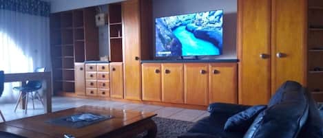 Comfort Apartment | Living area | Flat-screen TV