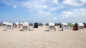 Beach huts numbered 140, 141, 142, 143, 144, 145, 146, 147, 148, 149, 150, 151, 152, 153, 154, 155, 156, 157, 158, 159, 160, 161, 162, 163, 164, 165, 166, 167, 168, 169, 170, 171, 172, 173, 174, 175, 176, 177, 178, 179, 180, 181, 182, 183, 184, 185, 186, 187, 188, 189, 190, 191, 192, 193, 194, 195, 196, 197, 198, 199, 200, 201, 202, 203, 204 - Apartment 'Ferienwohnung Dünenblick' with Sea View, Balcony and Wi-Fi (Wangerland)