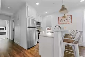 Fridge, microwave, oven, stovetop - West Bay Hideaway | Rooftop Condo Near Beach/DT TC (Traverse City)