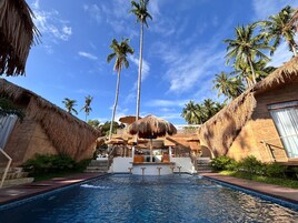 Outdoor pool, sun loungers, lifeguards on site