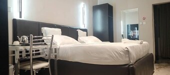 Triple Tee Luxury Hotel