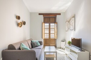 Apartamento, 1 quarto | Área de estar