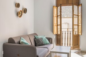Apartamento, 1 quarto | Área de estar