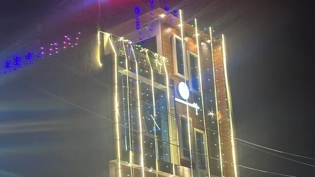 A building with a sign reading "Madhav Residency" at the top. - Madhav Residency (Mathura)