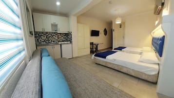Economy Studio | Premium bedding, desk, laptop workspace, bed sheets