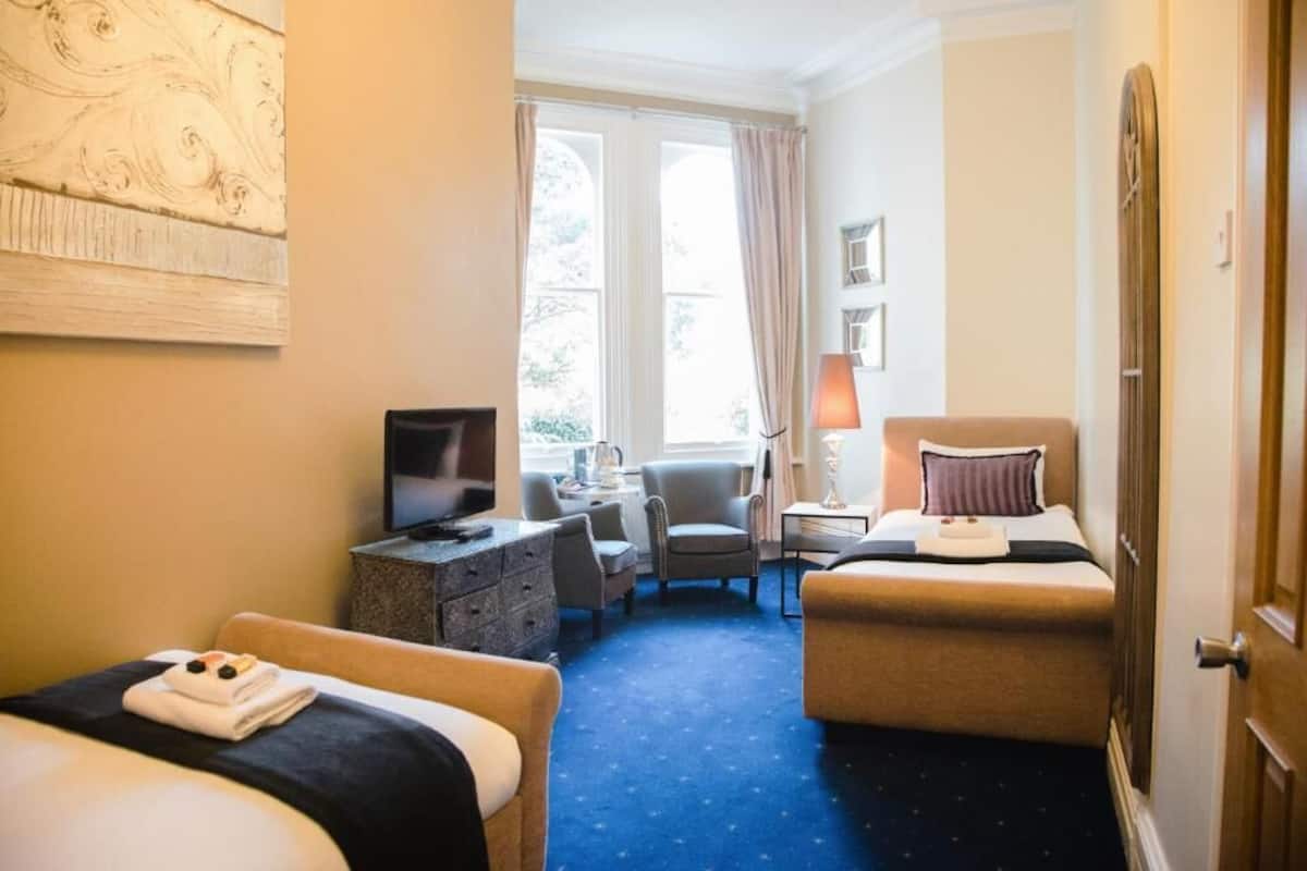 Eenvoudige Twin kamer | Gratis wifi, beddengoed