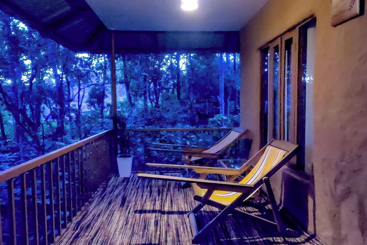 Exclusive Tree House, 1 King Bed, Non Smoking, Pool View | 1 bedroom, in-room safe, individually decorated, individually furnished